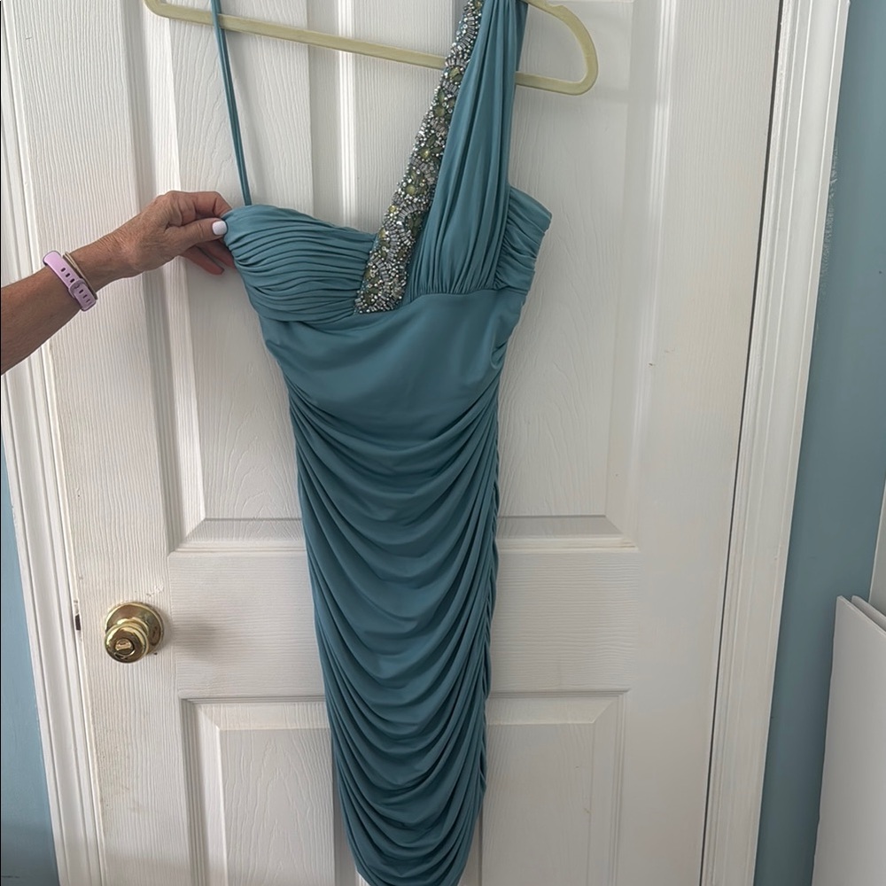 Mignon Blue Asymmetrical Sequin Gown. Perfect for prom!